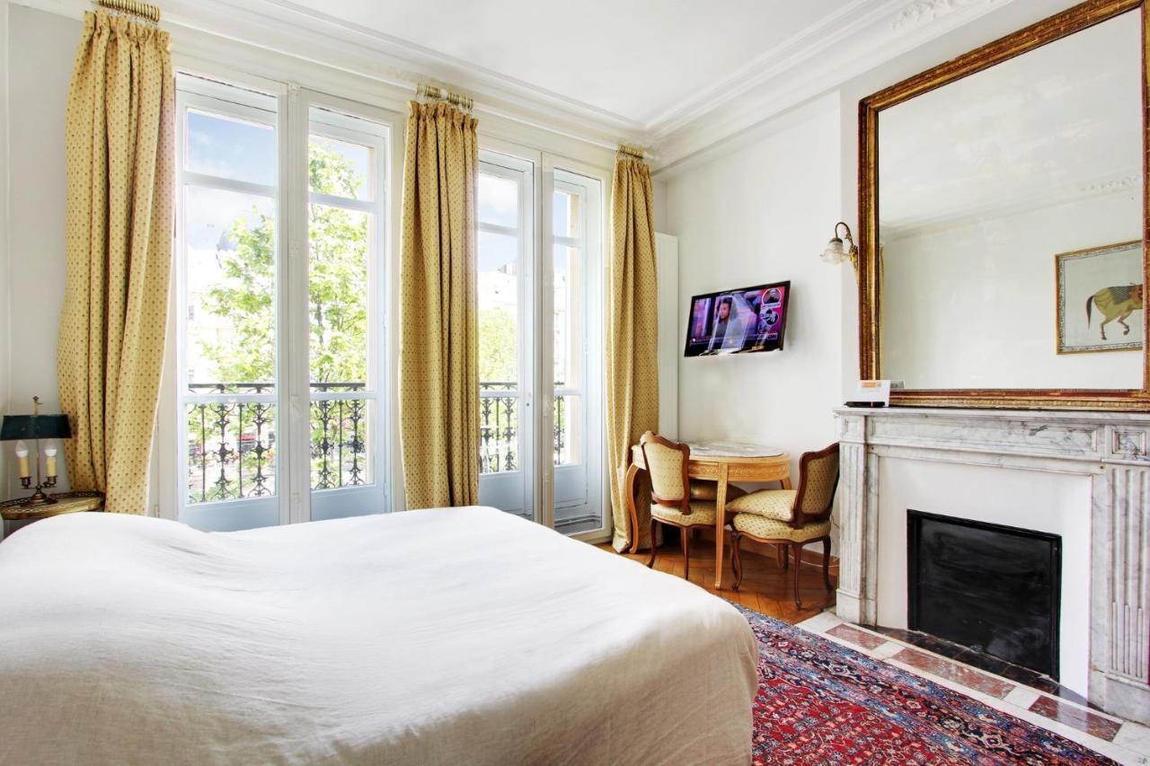 Suite Junior Avec Balcon Et Vue Sur Arc De Triomphe Paris Bagian luar foto